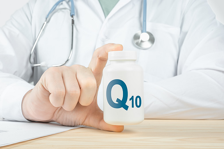 Doctor Holding CoQ10