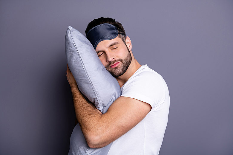 Man Hugging Pillow