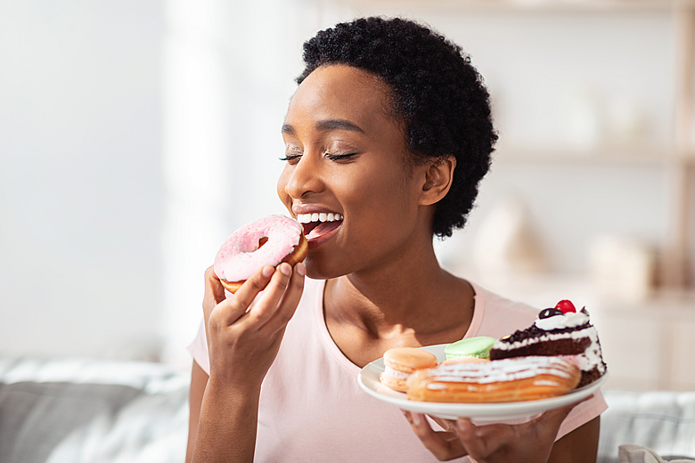 Woman eating a doughnut