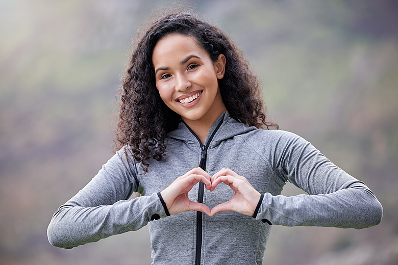 Woman Making Heart Sign