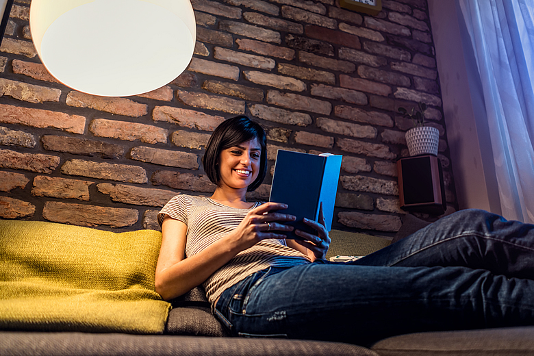 Woman Under Bright Lamp